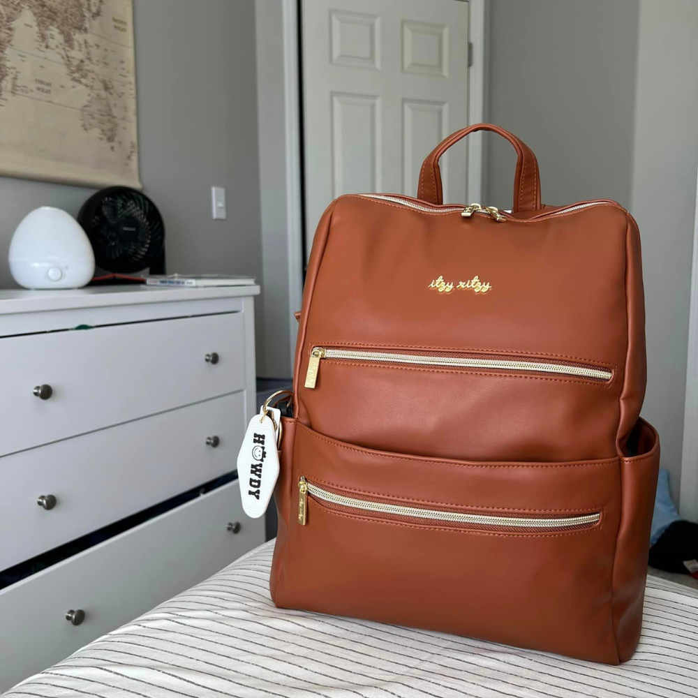 Itzy Ritzy Eras Backpack™ Diaper Bag - Cognac