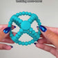 Bitzy Ball™ Flexible Teether