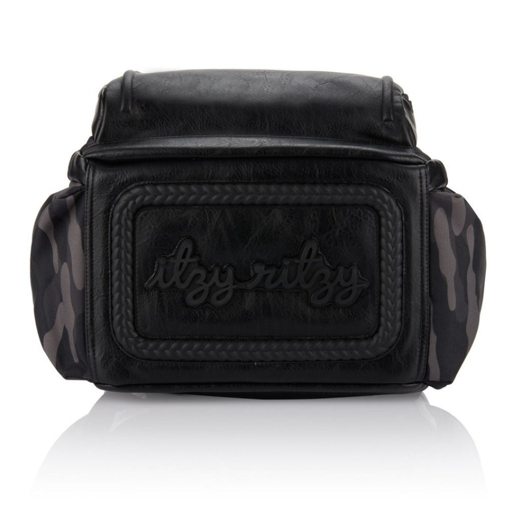 Chelsea + Cole for Itzy Ritzy Mini Diaper Bag Backpack - Studded Mini Diaper Bag Backpack with Changing Pad, 8 Pockets, Rubber Feet & Tassel Caramel