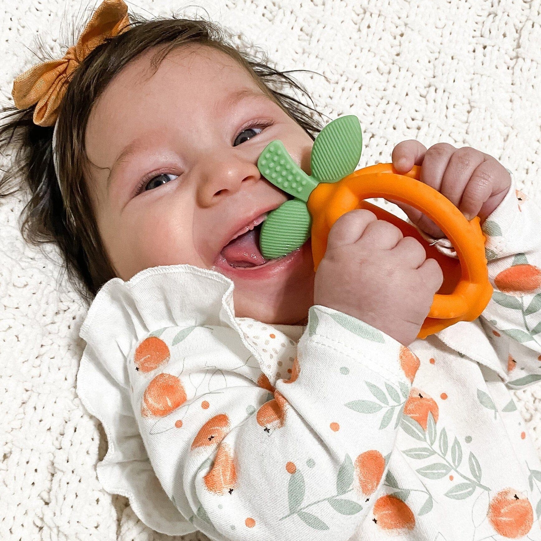 Cyber Bitzy Biter™ Teething Ball & Training Toothbrush Teething Itzy Ritzy® Clementine